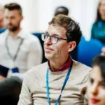 Man attentively listening during a court-ordered alcohol awareness class