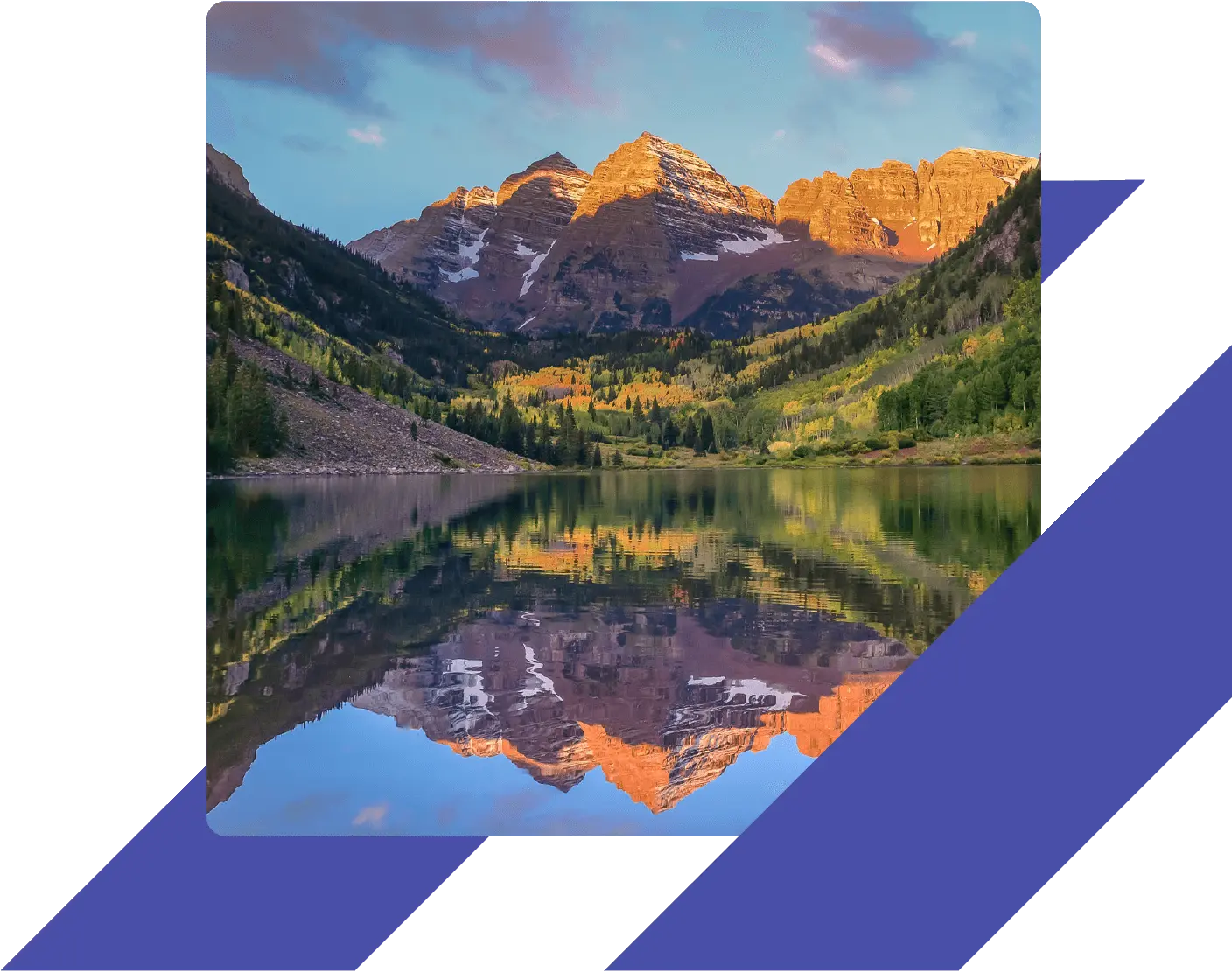 Maroon Bells mountains reflecting on a calm alpine lake