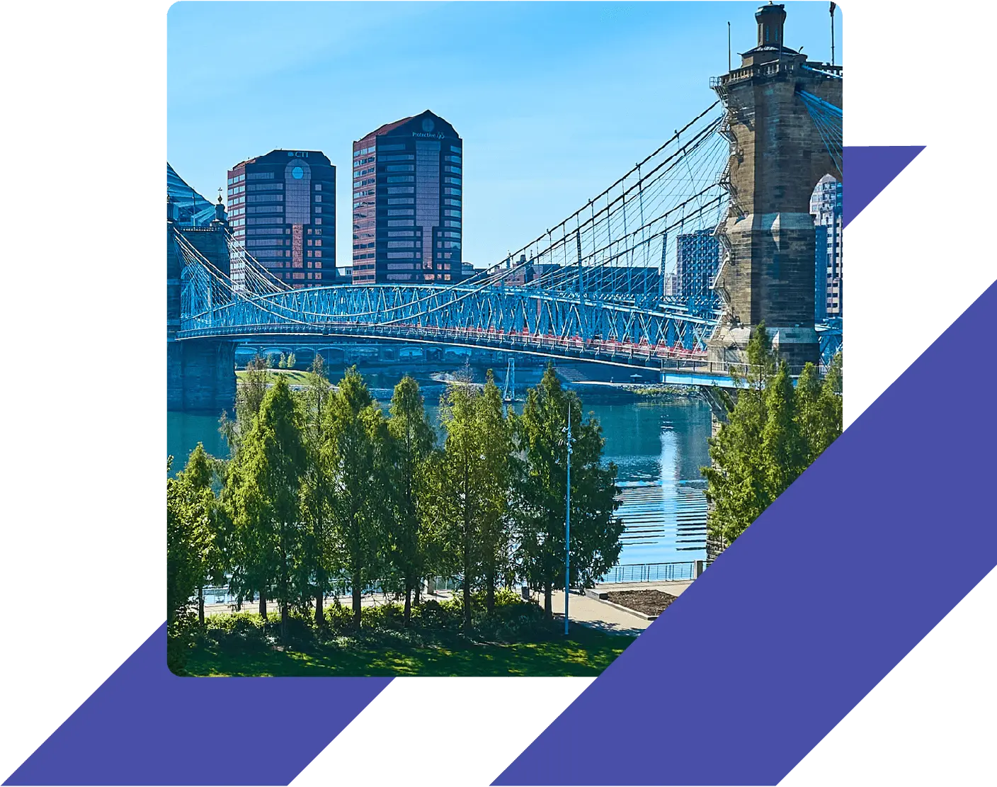 John A. Roebling Suspension Bridge spanning the Ohio River between Cincinnati, Ohio and Covington, Kentucky, with downtown buildings in the background.