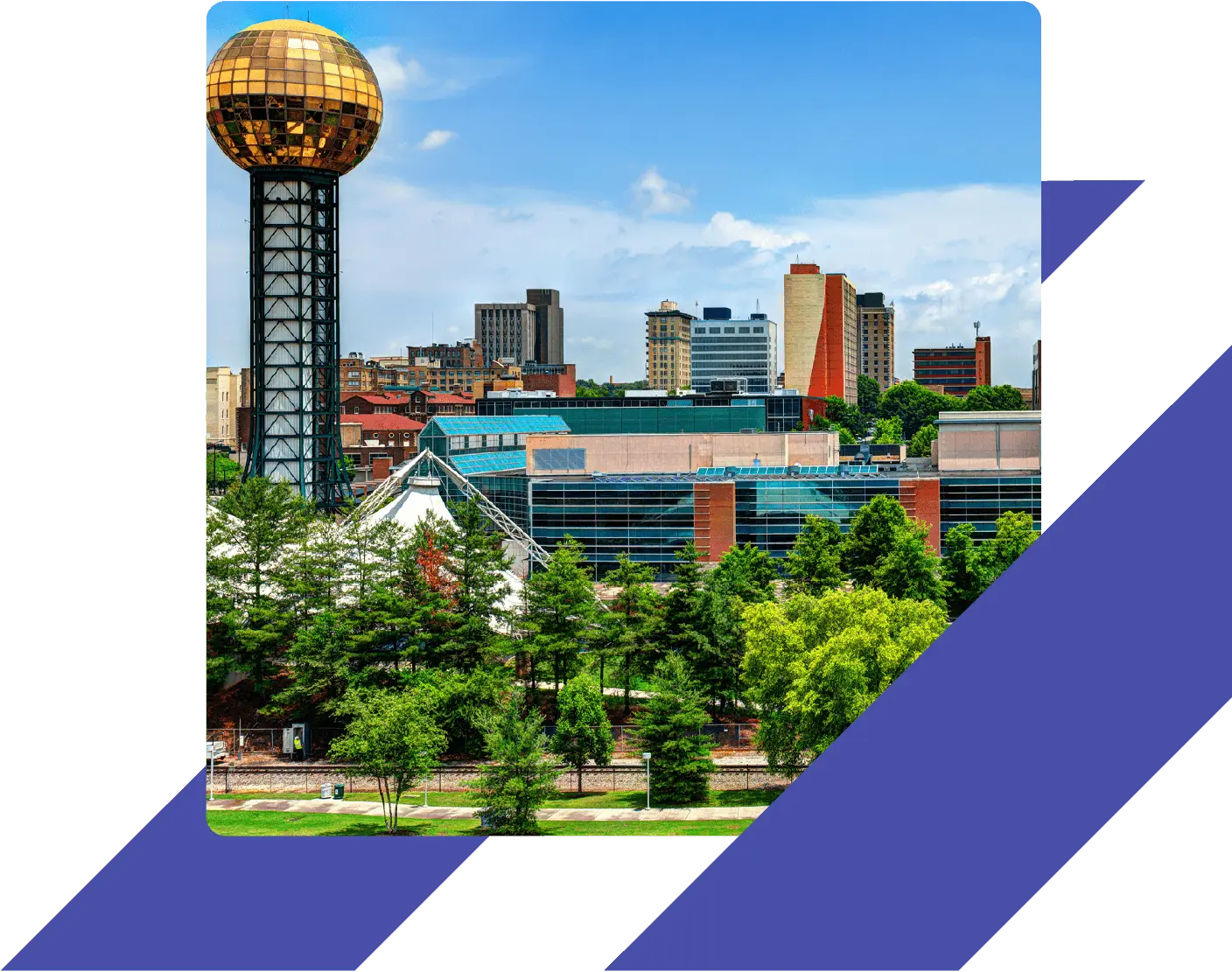 Downtown Knoxville, Tennessee skyline with the Sunsphere tower in the foreground on a sunny day.