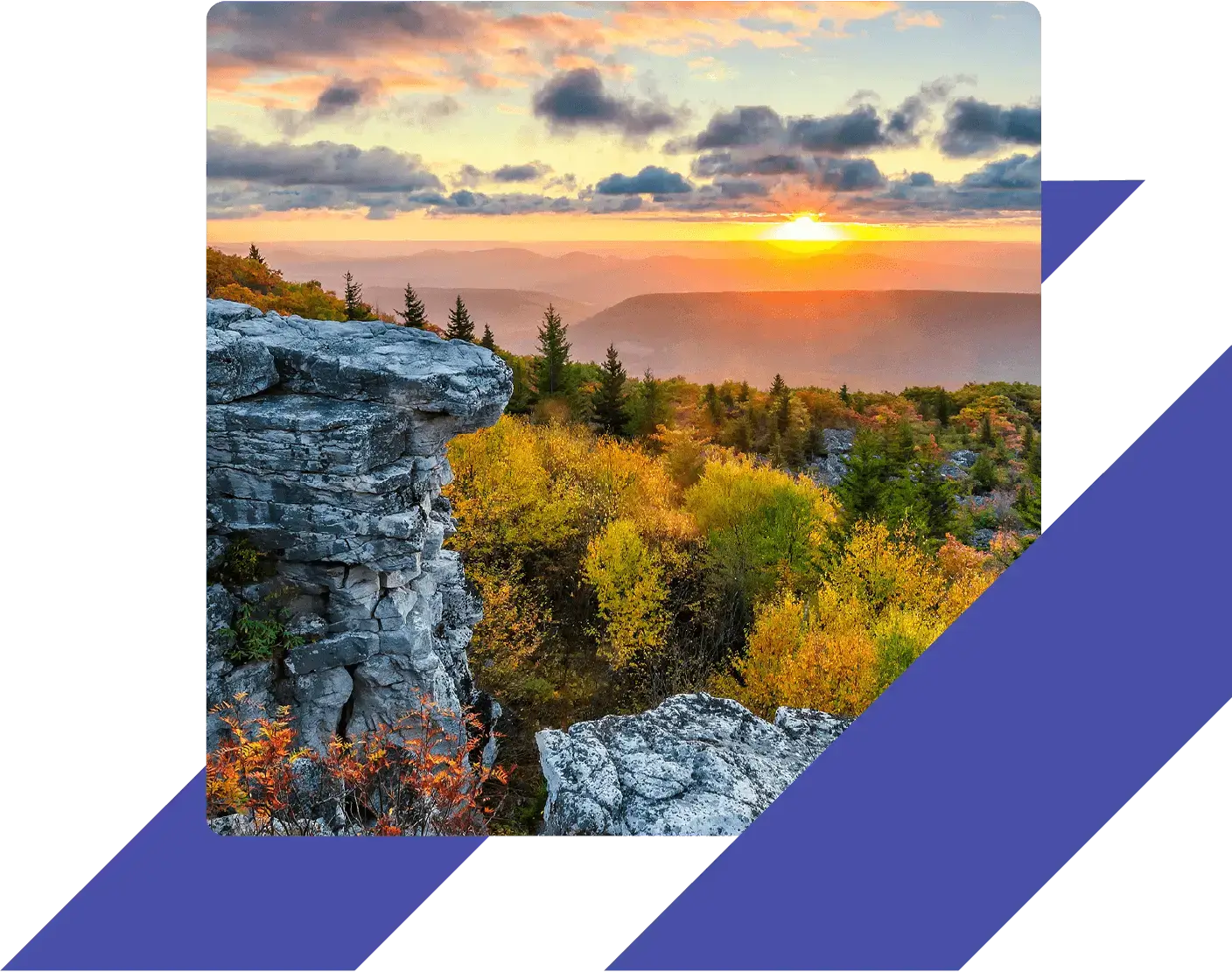 Rocky overlook at Dolly Sods Wilderness in West Virginia with vibrant fall foliage, evergreen trees, and a glowing sunset over distant mountain ridges.