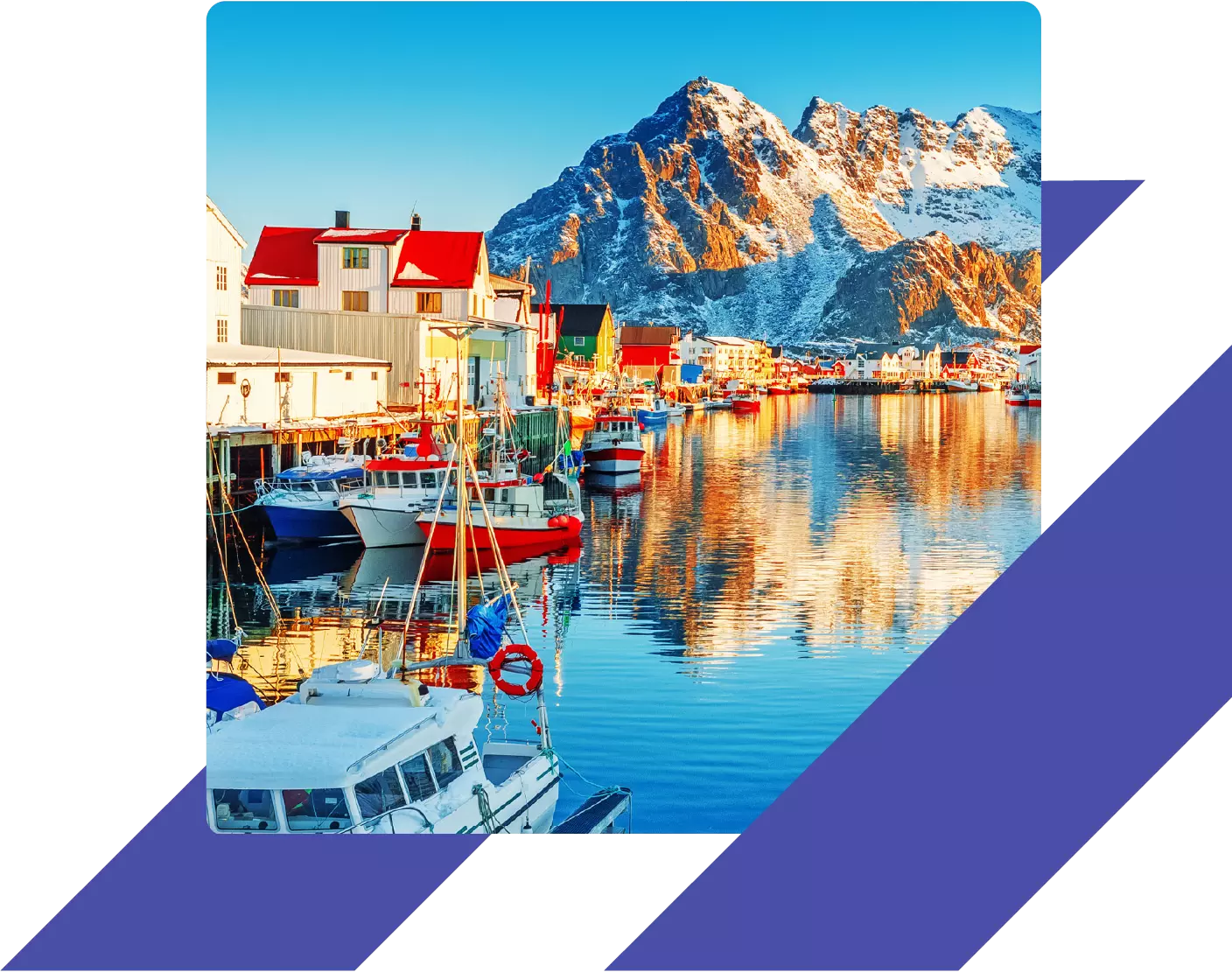 Boat harbor in front of mountains.